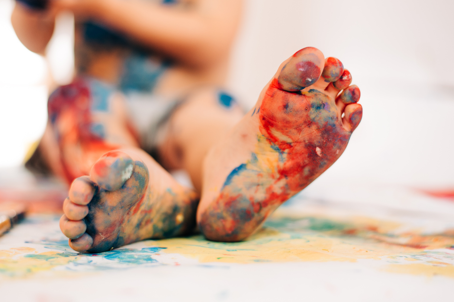 Child's feet with paint